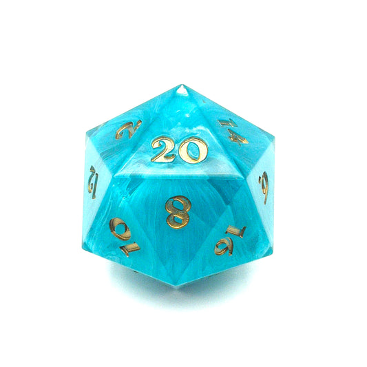 Blue swirl resin chonk blank cast in a clear resin shell, with gold inking. 20 face is showing