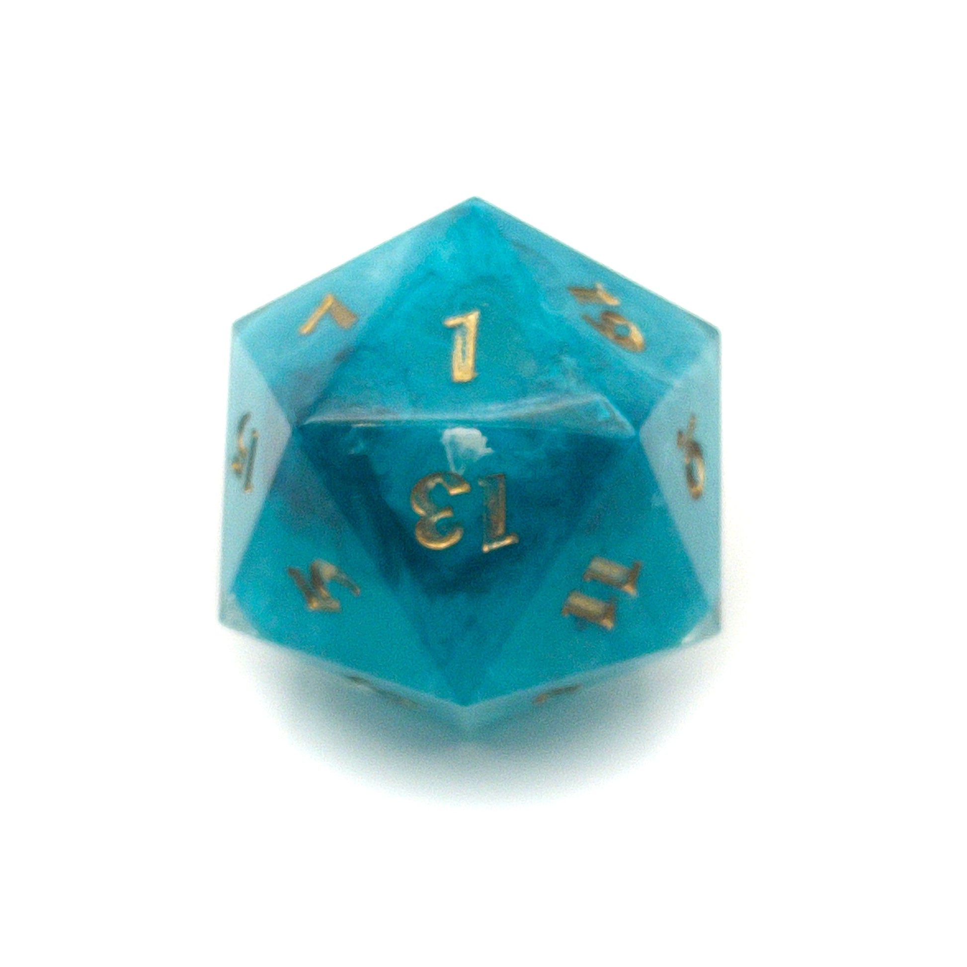 Blue swirl resin chonk blank cast in a clear resin shell, with gold inking. 1 face is showing