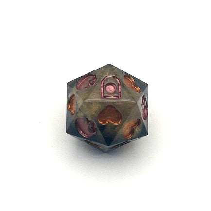 Resin D20 dice used for Death Saves in TTRPG. Semi transparent gold and black, skulls inked in copper and hearts inked in gold