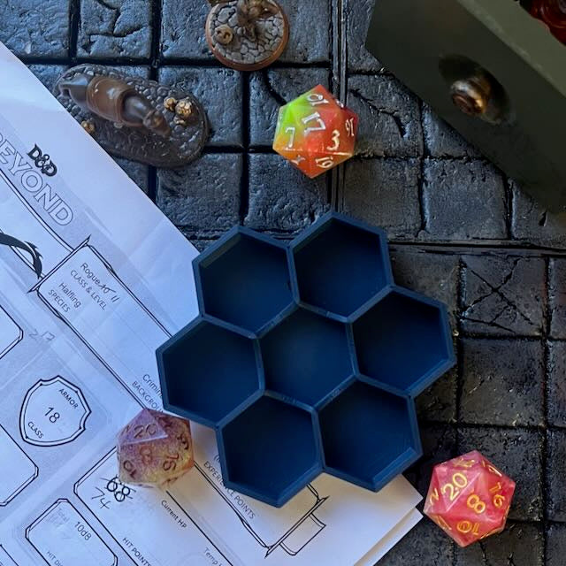 Matte Navy blue PLA 3D printed hexagonal dice tray on a D&D background
