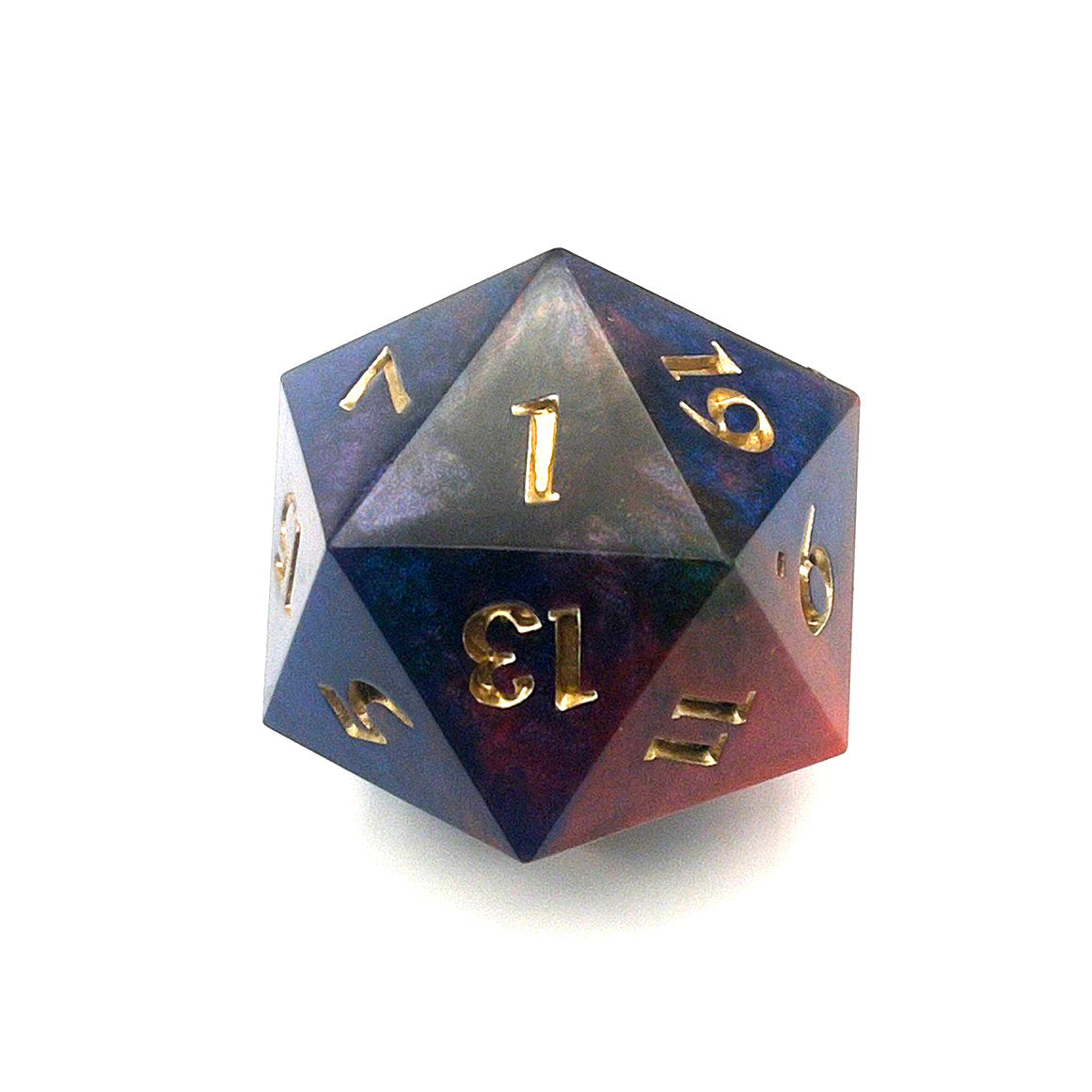 D20 chonk showing the 1 face. The resin is coloured with pigment powders using black, blue and red. The die is inked in chromed gold.