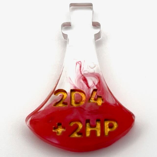 Resin potion bottle with red alcohol ink colouring and gold lettering