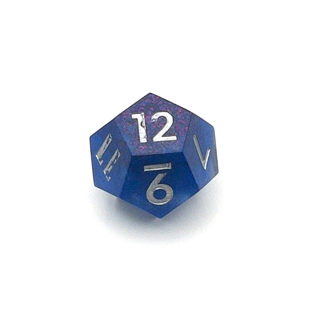 D12 TTRPG resin die, opaque blue in parts, with clear areas with white resin. Inked in silver