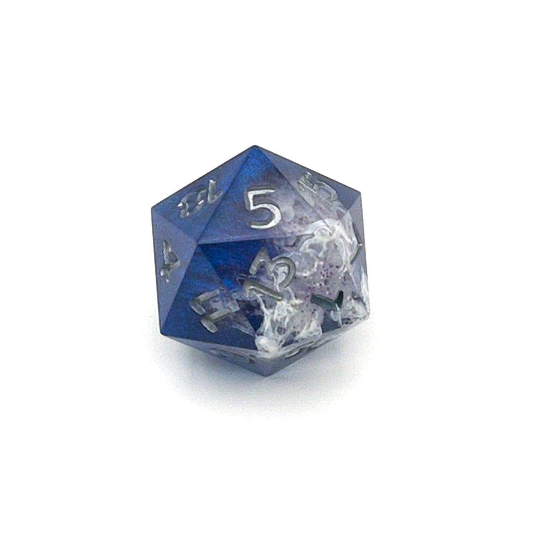 D20 TTRPG resin die, opaque blue in parts, with clear areas with white resin. Inked in silver