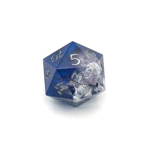 D20 TTRPG resin die, opaque blue in parts, with clear areas with white resin. Inked in silver