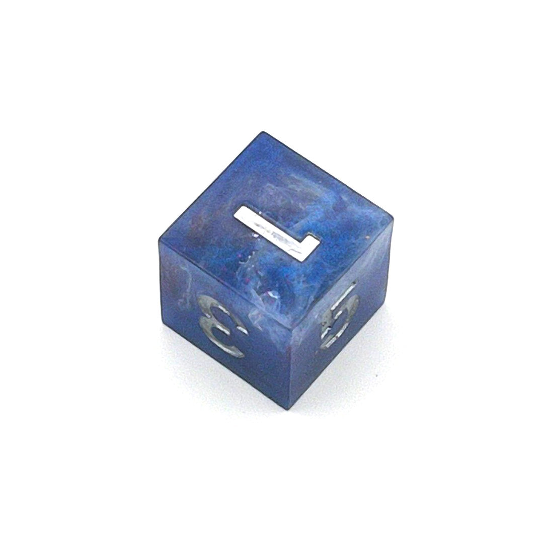 D6 TTRPG resin die, opaque blue in parts, with clear areas with white resin. Inked in silver