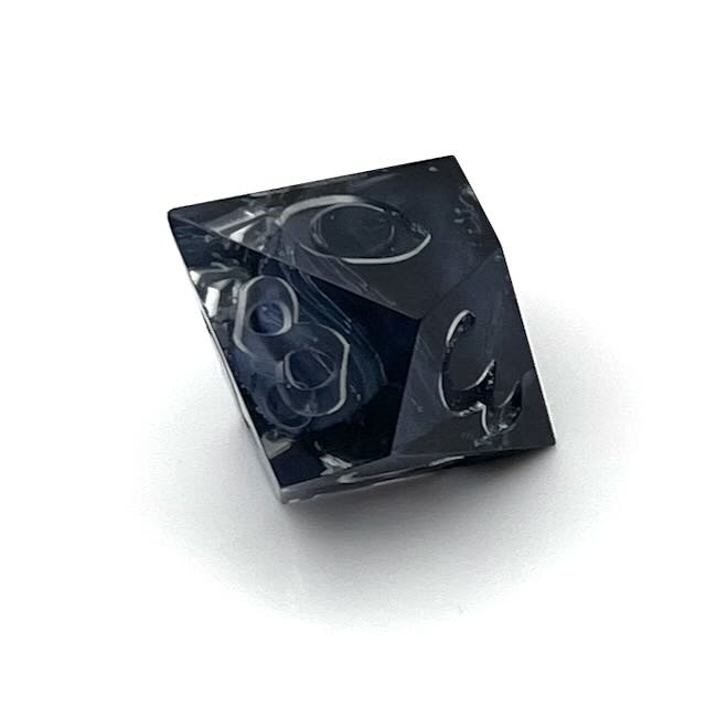 D10 clear and black petrie pour style resin dice with Uninked numbers