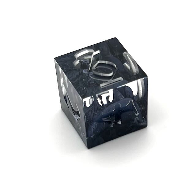 D6 clear and black petrie pour style resin dice with Uninked numbers