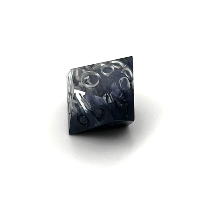 D100 clear and black petrie pour style resin dice with Uninked numbers