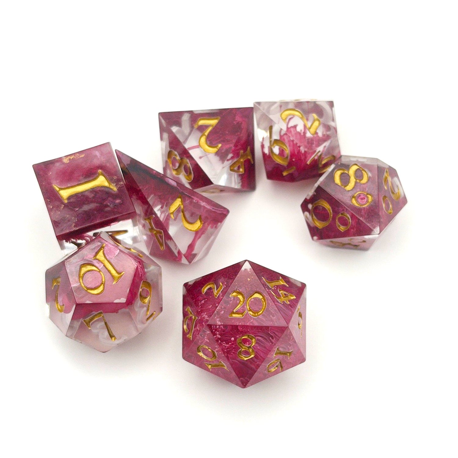 Full set of TTRPG resin dice, petri-pour in white and Sweet Cherry, inked in Gold