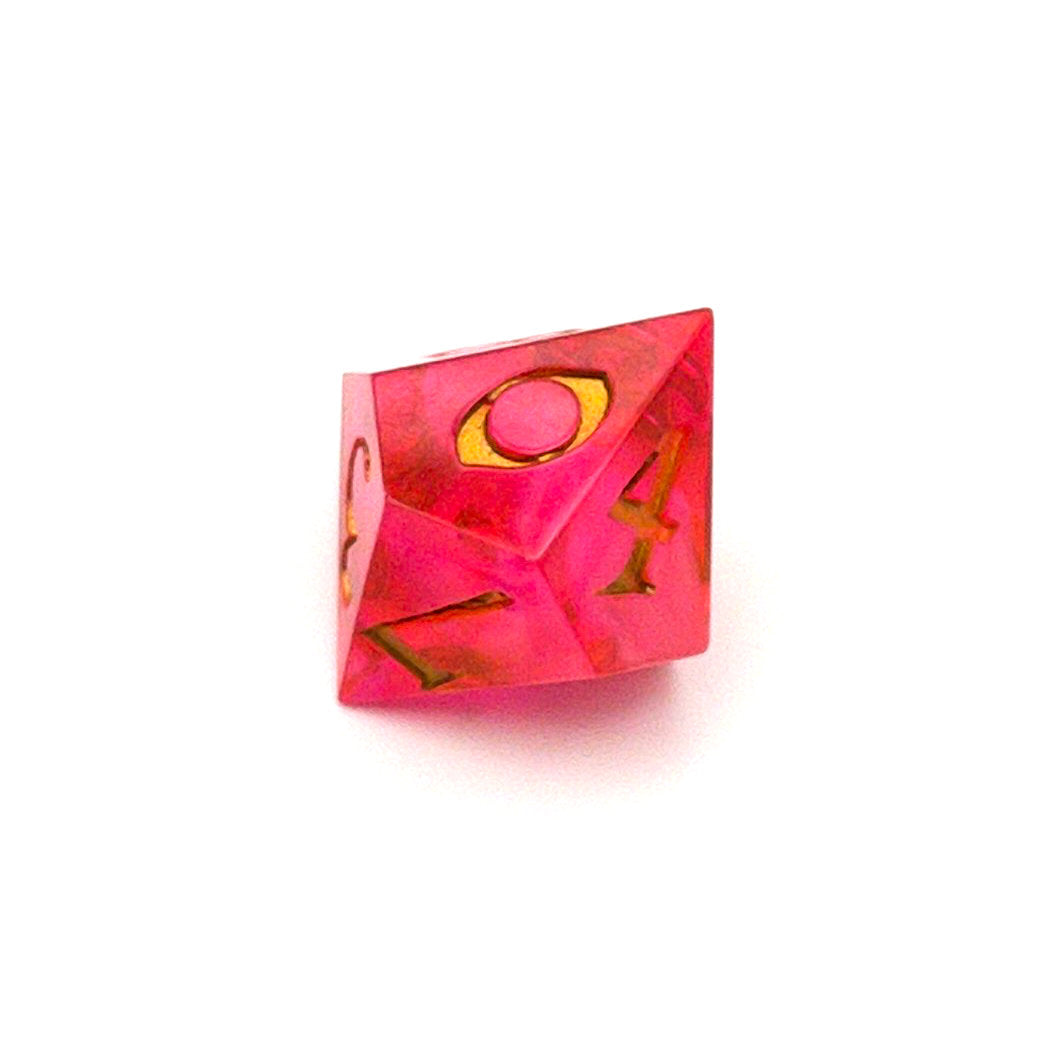 D10 semi-transparent resin die, coloured with red and pink dye, with a soft blur of resin coloured with Piñata Blanco Blanco white in the centre and inked in gold