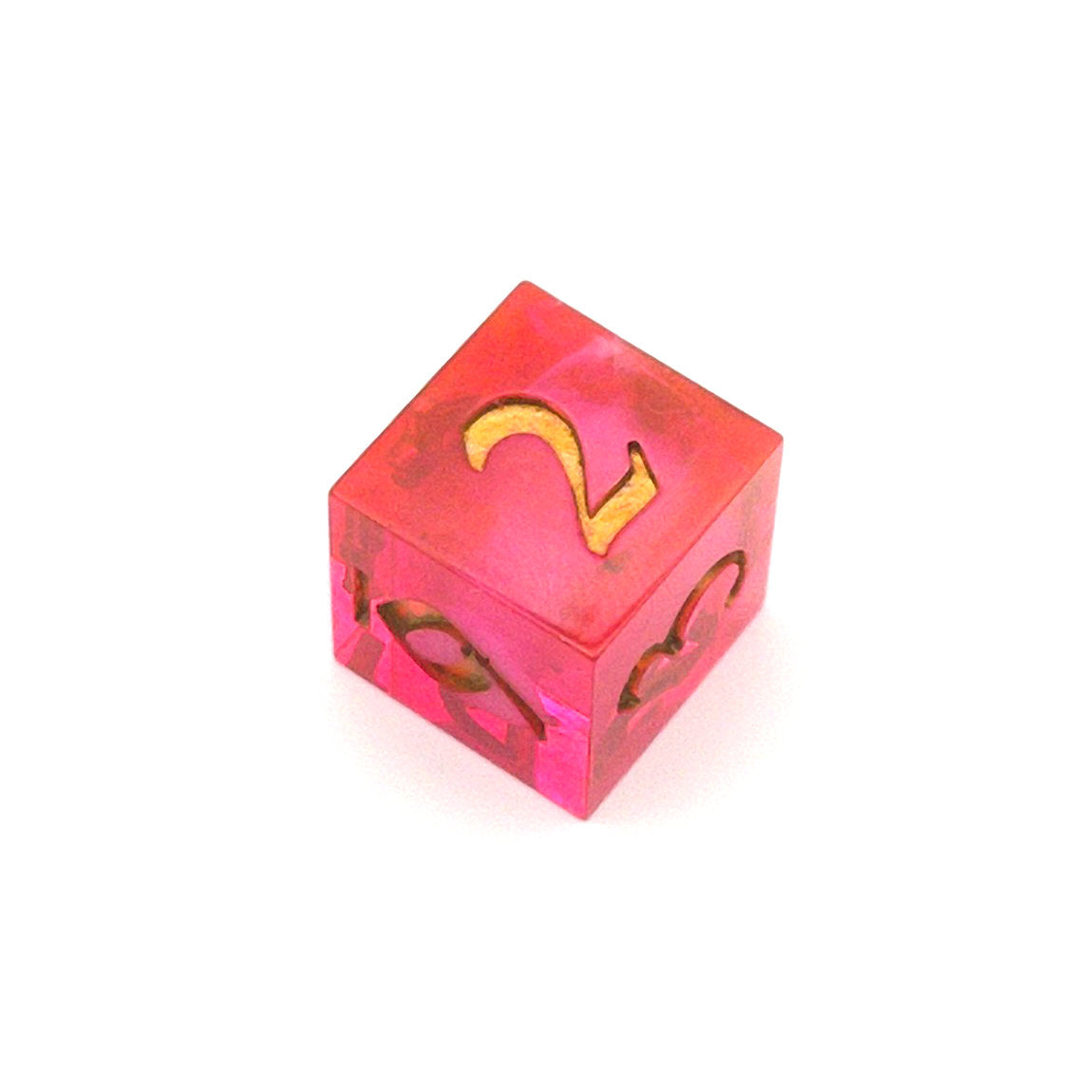 D6 semi-transparent resin die, coloured with red and pink dye, with a soft blur of resin coloured with Piñata Blanco Blanco white in the centre and inked in gold