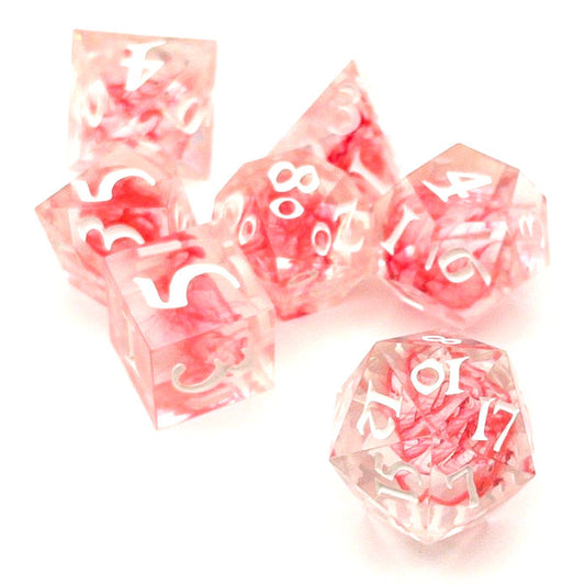 Full set of TTRPG dice. Transparent resin with a swirl of red dyed resin through the centre, known as 'Blood in the Water'. Inked in white