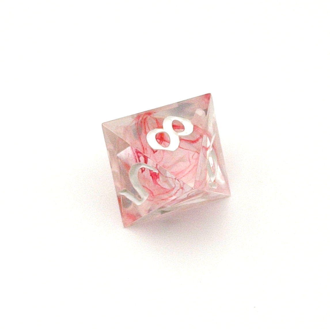 D8 TTRPG die. Transparent resin with a swirl of red dyed resin through the centre, known as 'Blood in the Water'. Inked in white