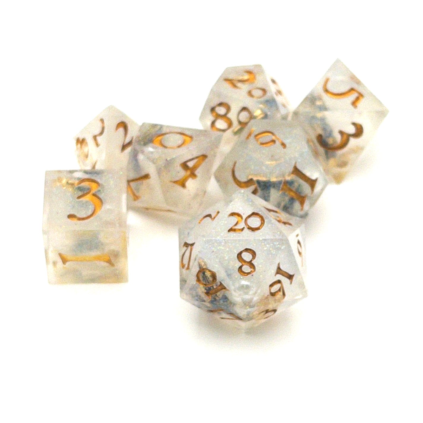 Full set of TTRPG dice, semi-transparent resin with translucent glitter and angel wing and pearl beads suspended inside. Inked in gold
