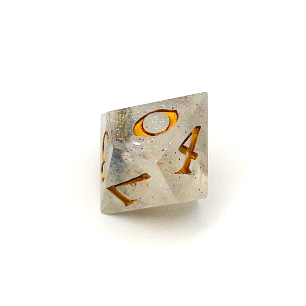 D10 TTRPG die, semi-transparent resin with translucent glitter and angel wing and pearl beads suspended inside. Inked in gold