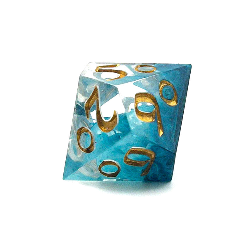 D100 TTRPG resin dice, petri-pour in white and Smurf blue, inked in Gold