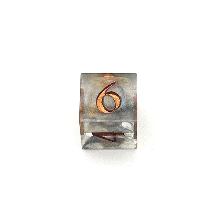 D6 Resin die using transparent black and gold dyes, inked in metallic copper paint
