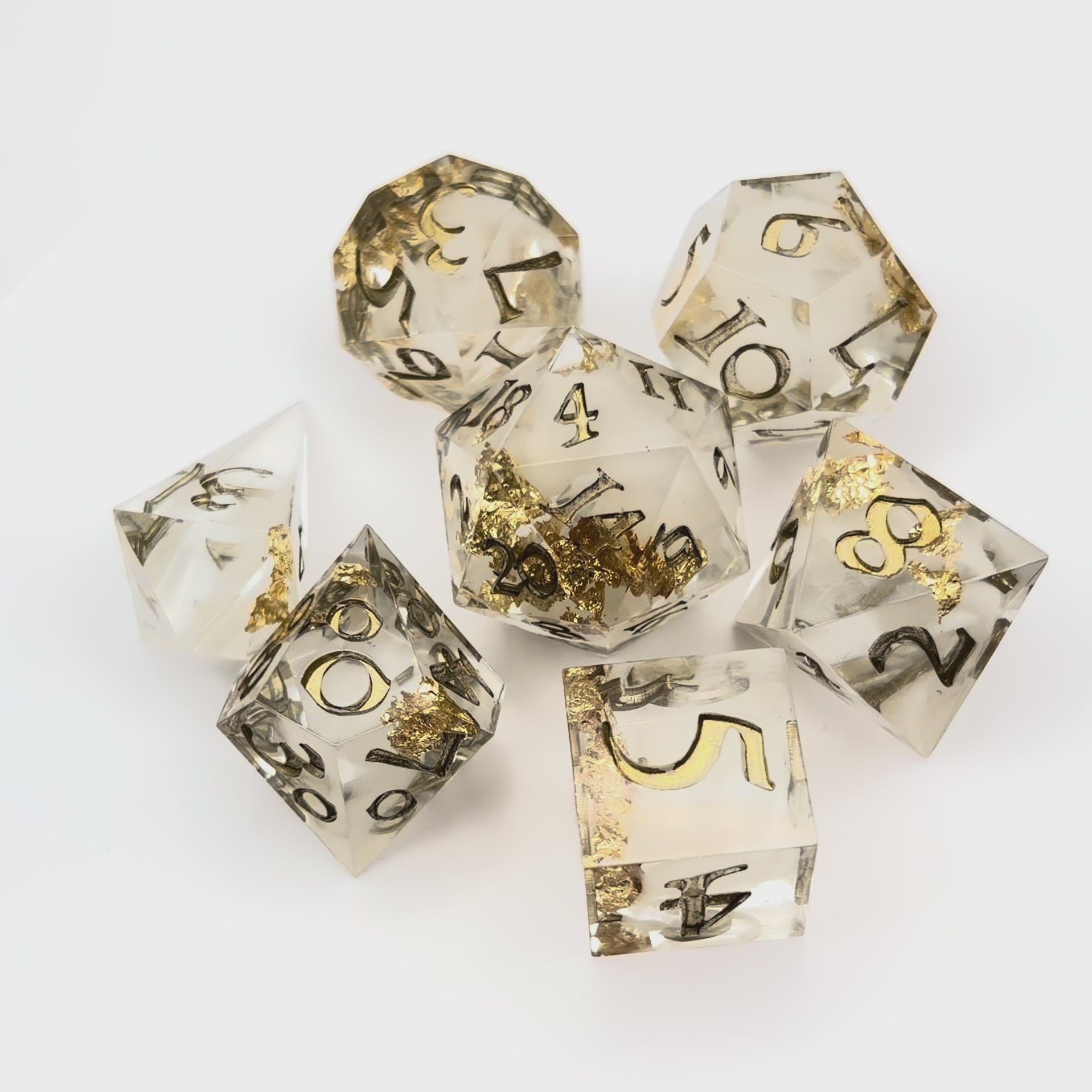 Video showing Cloudy white resin dropped into clear resin, with gold flakes. Inking is Gold