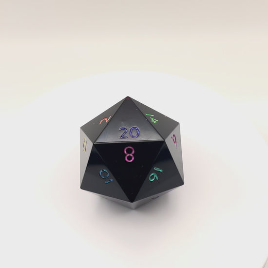 Video of Minimal Black Opaque D20 Chonk with multiple colours used for inking numbers